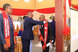 Induction rites performed by the Pioneer Internationl President of the College during the 2nd Annual Conference and Induction of New Members